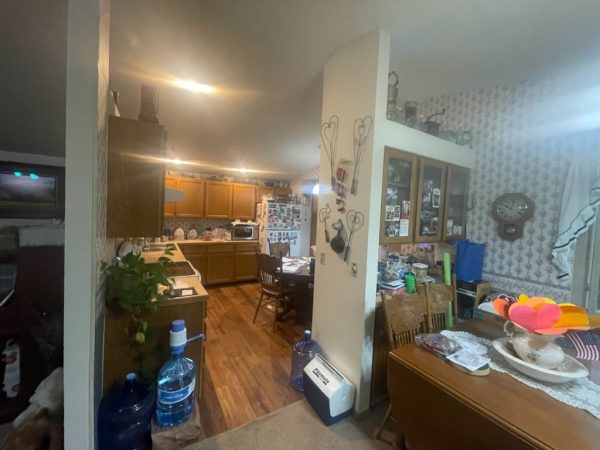 kitchen clutter in San Diego house we bought with cash